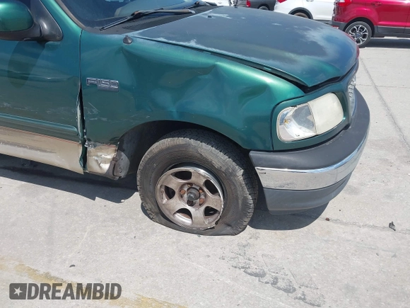 2000 Ford F-150 XL with VIN 1FTZX1729YNB93649, listed as a IAAI auction lot 42069599 with 1 mi miles. Bid and sale history available at carsss.com. Image 6.