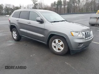 2011 Jeep Grand Cherokee 70th Anniversary with VIN 1J4RR4GG0BC608829, listed as a IAAI auction lot 41960876 with 231,714 mi miles. Bid and sale history available at carsss.com. Image 1.