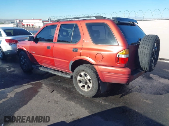 1999 Isuzu Rodeo S z VIN 4S2CK58W3X4307201, wystawiony jako IAAI lot #41884901 z przebiegiem 236 970 mil mil oraz . Historia ofert i sprzedaży dostępna na DreamBid. Obrazek 3.