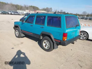 1996 Jeep Cherokee Sport z VIN 1J4FJ68S2TL103997, wystawiony jako IAAI lot #41517835 z przebiegiem 175 560 mil mil oraz . Historia ofert i sprzedaży dostępna na DreamBid. Obrazek 3.