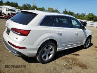 2020 Audi Q7 Premium z VIN WA1AJAF7XLD011977, wystawiony jako Copart lot #70385804 z przebiegiem 87 468 mil mil oraz Szkoda całkowita • Salvage title. Historia ofert i sprzedaży dostępna na DreamBid. Obrazek 3.