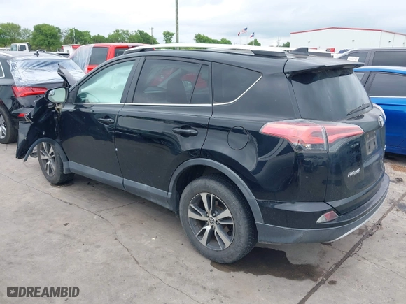2016 Toyota RAV4 XLE with VIN 2T3WFREV9GW276278, listed as a IAAI auction lot 41906293 with 112,000 mi miles. Bid and sale history available at carsss.com. Image 3.
