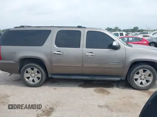 2011 GMC Yukon XL SLT z VIN 1GKS1KE07BR183572, wystawiony jako IAAI lot #42310565 z przebiegiem 341 982 mil mil oraz . Historia ofert i sprzedaży dostępna na DreamBid. Obrazek 13.