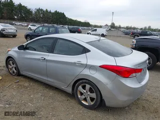 2013 Hyundai Elantra GLS with VIN 5NPDH4AE8DH287737, listed as a IAAI auction lot 41971804 with 217,565 mi miles. Bid and sale history available at carsss.com. Image 3.