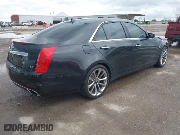 2014 Cadillac CTS Vsport Premium RWD z VIN 1G6AV5S89E0148907, wystawiony jako IAAI lot #41880678 z przebiegiem 148 052 mil mil oraz . Historia ofert i sprzedaży dostępna na DreamBid. Obrazek 4.
