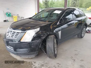 2014 Cadillac SRX Luxury Collection z VIN 3GYFNEE36ES677883, wystawiony jako IAAI lot #42260861 z przebiegiem 51 730 mil mil oraz . Historia ofert i sprzedaży dostępna na DreamBid. Obrazek 17.