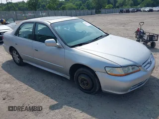 2002 Honda Accord SE z VIN 1HGCG66802A060352, wystawiony jako IAAI lot #42440137 z przebiegiem 128 610 mil mil oraz . Historia ofert i sprzedaży dostępna na DreamBid. Obrazek 1.