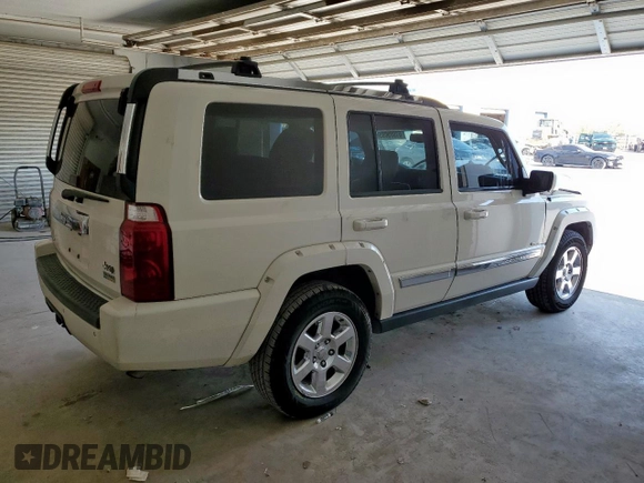 2008 Jeep Commander Limited with VIN 1J8HH58N28C130633, listed as a Copart auction lot 61009065 with 206,121 mi miles and Salvage title. Bid and sale history available at DreamBid. Image 3.