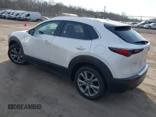 2022 Mazda CX-30 S Premium with VIN 3MVDMBDL7NM412263, listed as a IAAI auction lot 41779877 with 42,088 mi miles and . Bid and sale history available at carsss.com. Image 3.