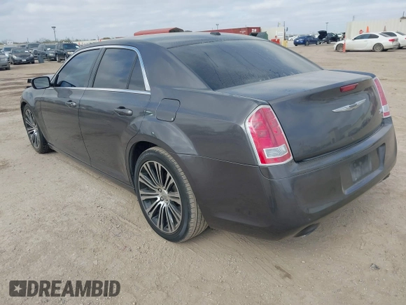 2013 Chrysler 300 with VIN 2C3CCABG7DH611105, listed as a IAAI auction lot 41769860 with 186,476 mi miles. Bid and sale history available at carsss.com. Image 3.