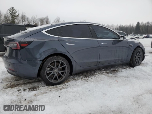 2019 Tesla Model 3 Mid Range with VIN 5YJ3E1EA1KF528950, listed as a Copart auction lot 43344475 with 57,272 mi miles and Clean Title. Bid and sale history available at DreamBid. Image 3.