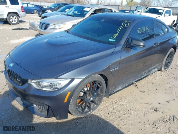 2015 BMW M4 with VIN WBS3R9C57FK334921, listed as a IAAI auction lot 41869773 with 107,058 mi miles. Bid and sale history available at carsss.com. Image 22.