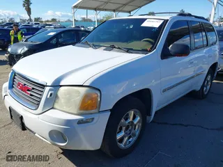 2002 GMC Envoy SLT with VIN 1GKDS13S522216498, listed as a IAAI auction lot 41642757 with 164,981 mi miles. Bid and sale history available at carsss.com. Image 20.