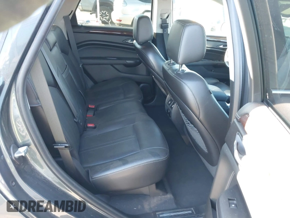 2013 Cadillac SRX Premium Collection z VIN 3GYFNEE37DS525612, wystawiony jako IAAI lot #41344221 z przebiegiem 119 573 mil mil oraz . Historia ofert i sprzedaży dostępna na DreamBid. Obrazek 8.
