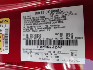 2021 Ford Mustang EcoBoost with VIN 1FA6P8TH7M5125744, listed as a IAAI auction lot 42520877 with 31,953 mi miles and . Bid and sale history available at DreamBid. Image 9.
