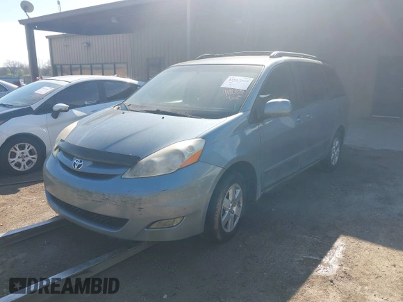 2007 Toyota Sienna XLE with VIN 5TDZK22C67S026114, listed as a IAAI auction lot 41913559 with 80,803 mi miles. Bid and sale history available at carsss.com. Image 2.