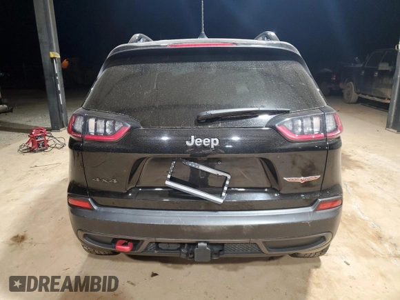 2022 Jeep Cherokee Trailhawk with VIN 1C4PJMBX5ND526816, listed as a Copart auction lot 87394464 with 25,070 mi miles and Salvage Title. Bid and sale history available at carsss.com. Image 6.