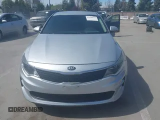 2018 Kia Optima LX with VIN 5XXGT4L31JG267716, listed as a IAAI auction lot 41890611 with 63,491 mi miles and . Bid and sale history available at carsss.com. Image 12.