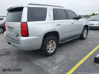 2016 Chevrolet Tahoe LS with VIN 1GNSCAKC5GR369222, listed as a IAAI auction lot 41216640 with 95,549 mi miles. Bid and sale history available at carsss.com. Image 4.