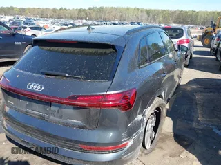 2021 Audi e-tron Premium with VIN WA1AAAGE5MB013159, listed as a IAAI auction lot 41875335 with 46,471 mi miles. Bid and sale history available at carsss.com. Image 4.
