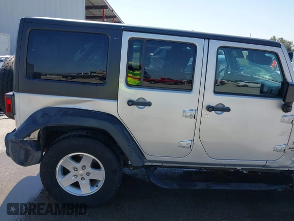2010 Jeep Wrangler Unlimited Sport with VIN 1J4BA3H17AL211887, listed as a IAAI auction lot 41778324 with 185,626 mi miles. Bid and sale history available at carsss.com. Image 18.