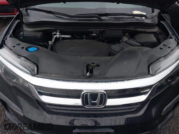 2022 Honda Pilot EX-L with VIN 5FNYF6H58NB018372, listed as a IAAI auction lot 42327580 with 79,332 mi miles and . Bid and sale history available at DreamBid. Image 10.