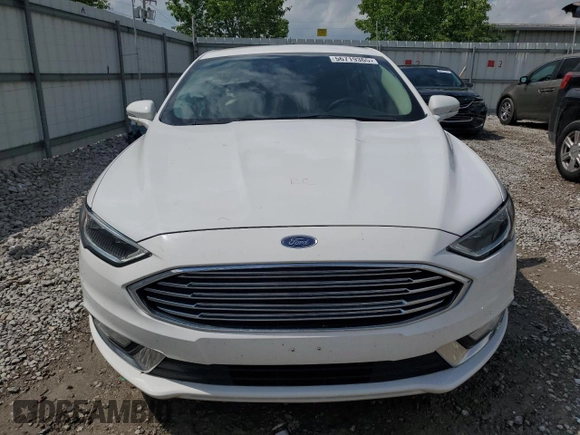 2017 Ford Fusion SE z VIN 3FA6P0H92HR203496, wystawiony jako Copart lot #56719365 z przebiegiem 99 817 mil mil oraz Szkoda całkowita • Salvage title. Historia ofert i sprzedaży dostępna na DreamBid. Obrazek 5.