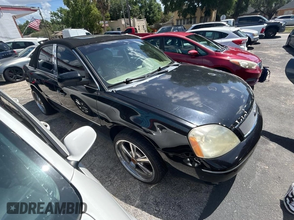 2005 Ford Five Hundred SEL z VIN 1FAFP24185G146669, wystawiony jako Copart lot #51990845 z przebiegiem Nie podano mil oraz Czysty tytuł • Clean title. Historia ofert i sprzedaży dostępna na DreamBid. Obrazek 1.