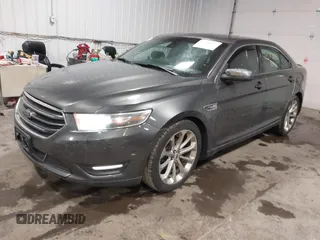 2015 Ford Taurus Limited with VIN 1FAHP2J86FG106828, listed as a IAAI auction lot 41748997 with 221,216 mi miles. Bid and sale history available at carsss.com. Image 2.