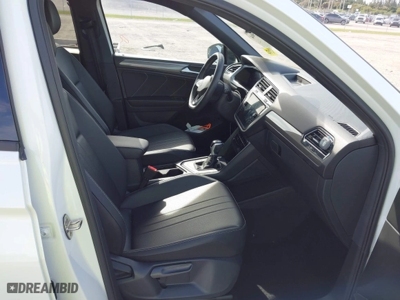 2023 Volkswagen Tiguan SE R-Line Black with VIN 3VVCB7AX0PM090710, listed as a IAAI auction lot 41256904 with 12,819 mi miles. Bid and sale history available at carsss.com. Image 5.