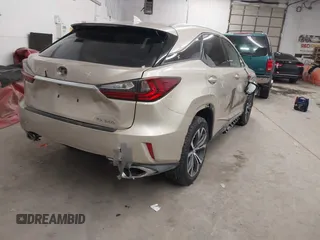 2019 Lexus RX with VIN 2T2BZMCA9KC200194, listed as a IAAI auction lot 41595521 with 70,038 mi miles. Bid and sale history available at carsss.com. Image 4.