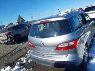 2014 Mazda 5 Sport with VIN JM1CW2BLXE0168119, listed as a IAAI auction lot 41527688 with 142,357 mi miles and . Bid and sale history available at DreamBid. Image 16.