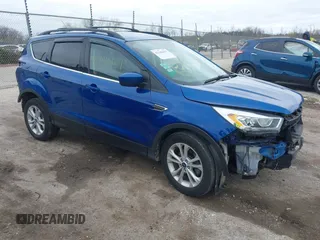 2017 Ford Escape SE z VIN 1FMCU0GD4HUA05745, wystawiony jako IAAI lot #42184437 z przebiegiem 80 221 mil mil oraz . Historia ofert i sprzedaży dostępna na DreamBid. Obrazek 1.