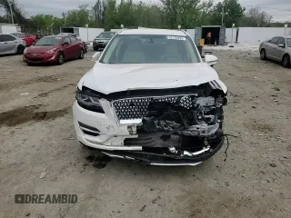 2019 Lincoln MKC Select z VIN 5LMCJ2D99KUL39648, wystawiony jako Copart lot #53755895 z przebiegiem 57 623 mil mil oraz Szkoda całkowita • Salvage title. Historia ofert i sprzedaży dostępna na DreamBid. Obrazek 14.