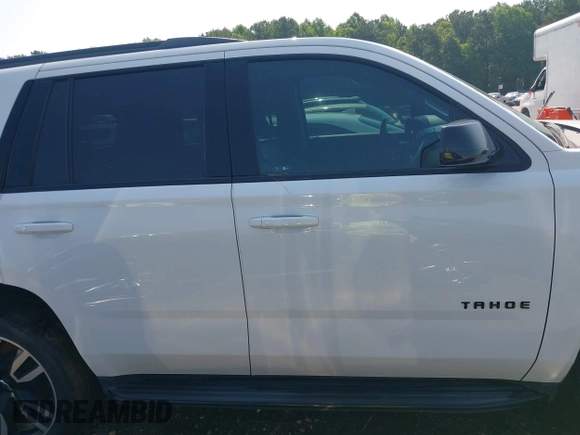 2019 Chevrolet Tahoe LT with VIN 1GNSCBKC2KR128944, listed as a IAAI auction lot 42600686 with 92,980 mi miles and . Bid and sale history available at DreamBid. Image 14.