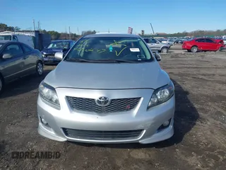 2009 Toyota Corolla with VIN 2T1BU40E19C177059, listed as a IAAI auction lot 41831891 with 999,999 mi miles. Bid and sale history available at carsss.com. Image 6.