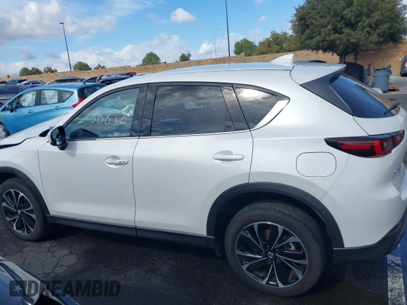 2023 Mazda CX-5 2.5 S Premium Plus Package with VIN JM3KFBEM4P0112803, listed as a IAAI auction lot 41588872 with 25,087 mi miles. Bid and sale history available at carsss.com. Image 14.