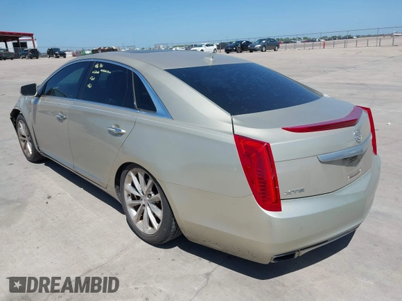 2014 Cadillac XTS Premium with VIN 2G61P5S33E9157607, listed as a IAAI auction lot 42004612 with 111,047 mi miles and . Bid and sale history available at DreamBid. Image 3.