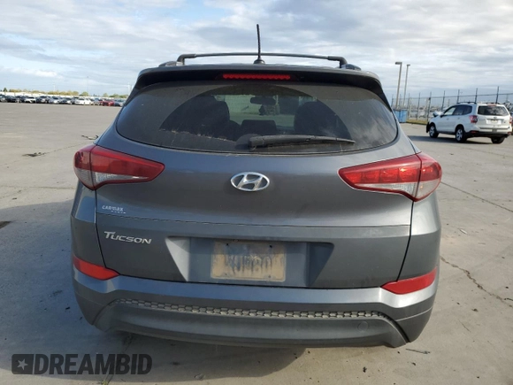 2017 Hyundai Tucson SE with VIN KM8J33A40HU330073, listed as a Copart auction lot 50713935 with 135,673 mi miles and Salvage Title. Bid and sale history available at DreamBid. Image 6.