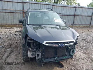 2018 Subaru Forester z VIN JF2SJABC1JH534213, wystawiony jako IAAI lot #42151142 z przebiegiem 108 714 mil mil oraz . Historia ofert i sprzedaży dostępna na DreamBid. Obrazek 13.