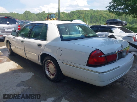 2002 Mercury Grand Marquis LS Premium with VIN 2MEFM75W82X642134, listed as a IAAI auction lot 42134033 with 252,295 mi miles and . Bid and sale history available at DreamBid. Image 3.