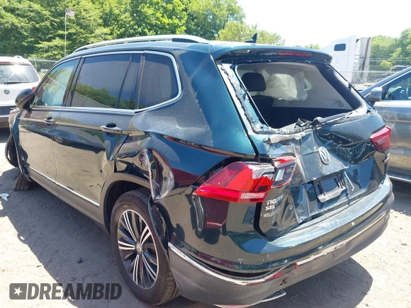2018 Volkswagen Tiguan SEL with VIN 3VV2B7AX9JM058518, listed as a IAAI auction lot 42558129 with 82,807 mi miles and . Bid and sale history available at DreamBid. Image 3.