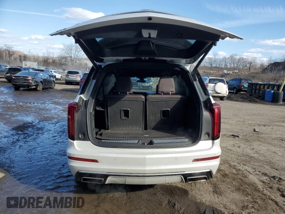 2020 Cadillac XT6 AWD Premium Luxury z VIN 1GYKPDRS0LZ115837, wystawiony jako Copart lot #47559405 z przebiegiem 82 581 mil mil oraz Szkoda całkowita • Salvage title. Historia ofert i sprzedaży dostępna na DreamBid. Obrazek 6.