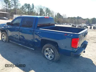 2018 Chevrolet Silverado 1500 LT with VIN 3GCUKREC9JG211391, listed as a IAAI auction lot 41710886 with 113,989 mi miles. Bid and sale history available at carsss.com. Image 3.
