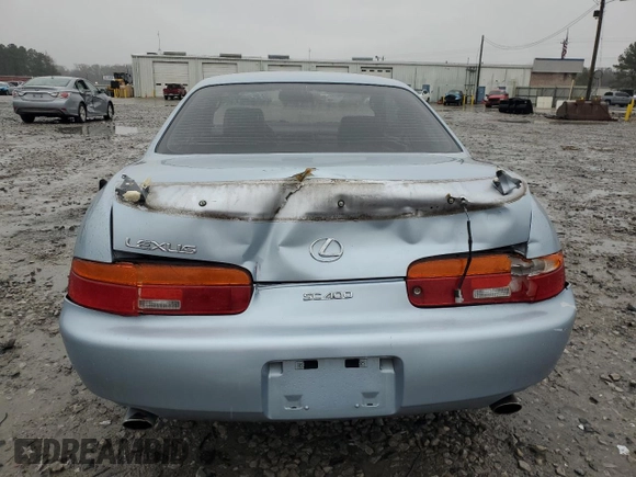 1995 Lexus SC 400 z VIN JT8UZ30CXS0039926, wystawiony jako Copart lot #89373825 z przebiegiem 252 843 mil mil oraz Szkody całkowita. Historia ofert i sprzedaży dostępna na DreamBid. Obrazek 6.