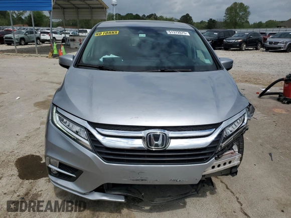 2018 Honda Odyssey Touring with VIN 5FNRL6H81JB078091, listed as a Copart auction lot 51372075 with 104,144 mi miles and Salvage Title. Bid and sale history available at carsss.com. Image 5.