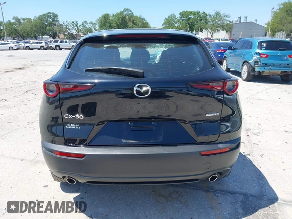 2021 Mazda CX-30 S with VIN 3MVDMAAL7MM268341, listed as a IAAI auction lot 42051154 with 19,539 mi miles and . Bid and sale history available at carsss.com. Image 16.