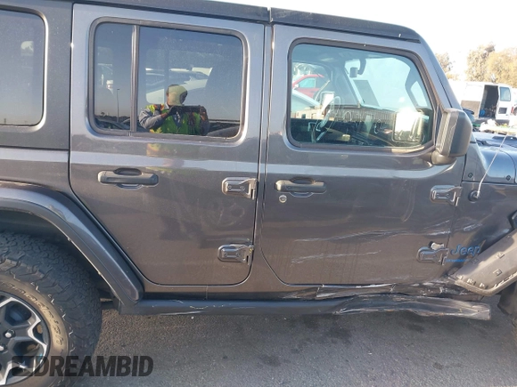 2023 Jeep Wrangler Rubicon with VIN 1C4JJXR67PW662277, listed as a IAAI auction lot 41950065 with 35,714 mi miles and . Bid and sale history available at DreamBid. Image 13.