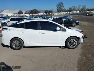 2021 Toyota Prius L Eco with VIN JTDKAMFU7M3148089, listed as a IAAI auction lot 41614915 with 119,725 mi miles. Bid and sale history available at carsss.com. Image 14.