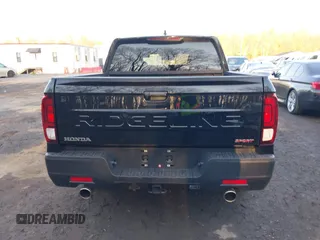 2024 Honda Ridgeline Sport with VIN 5FPYK3F14RB012334, listed as a IAAI auction lot 41542412 with 1,817 mi miles and . Bid and sale history available at DreamBid. Image 16.